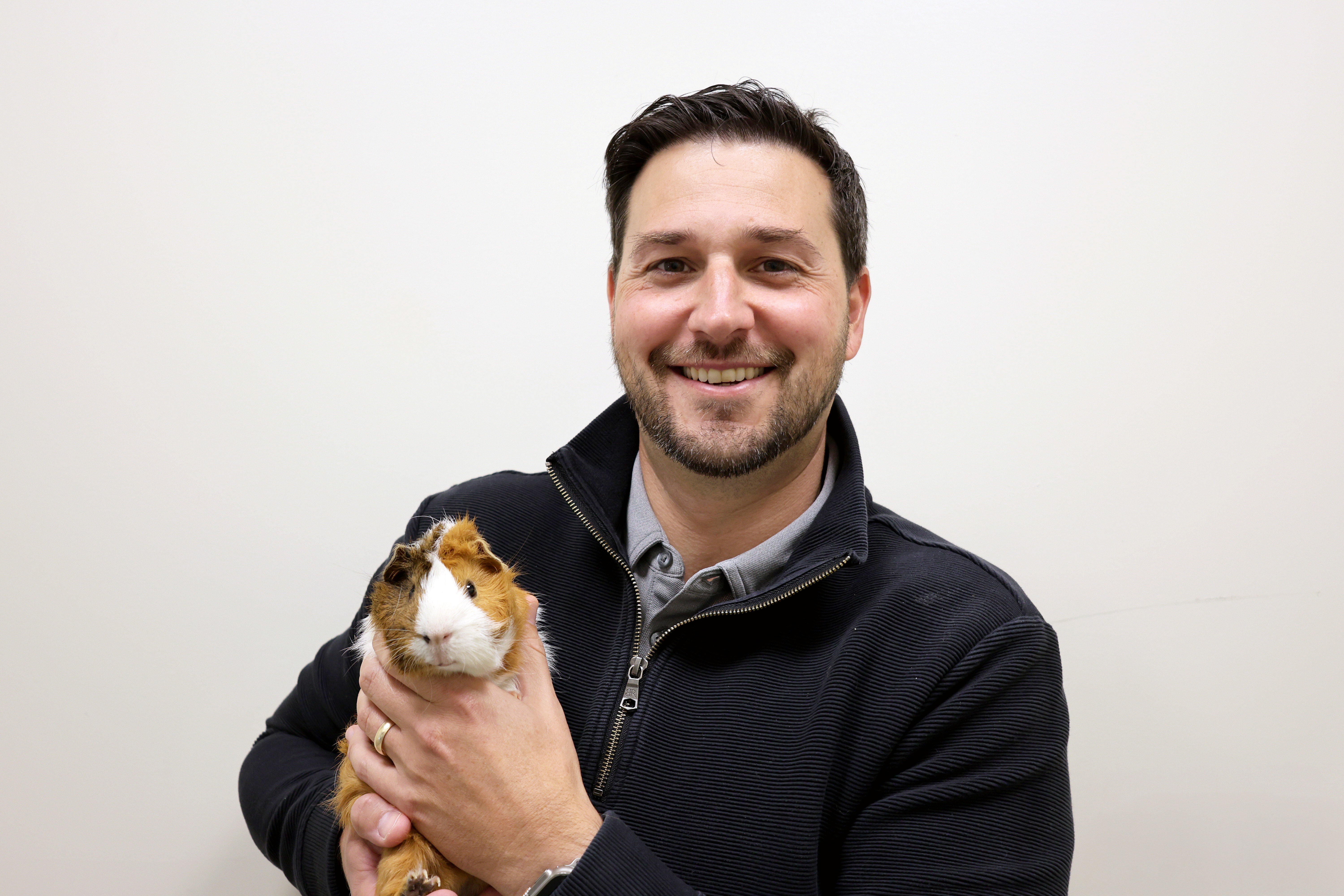 Man holding a guinea pig